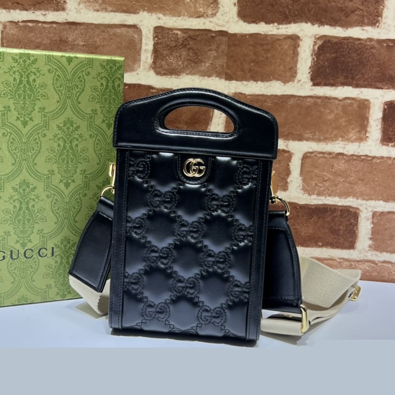 G*u*i top handle bags
